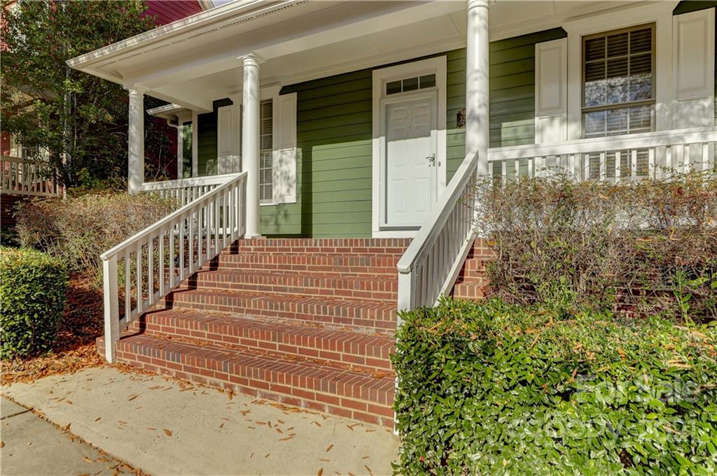 3229 Fifth Baxter Crossing Fort Mill, SC 29708 - Photo 5 of 46 a view of stairs with wooden floor and fence