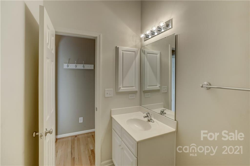 3229 Fifth Baxter Crossing Fort Mill, SC 29708 - Photo 42 of 46 a bathroom with a sink and mirror