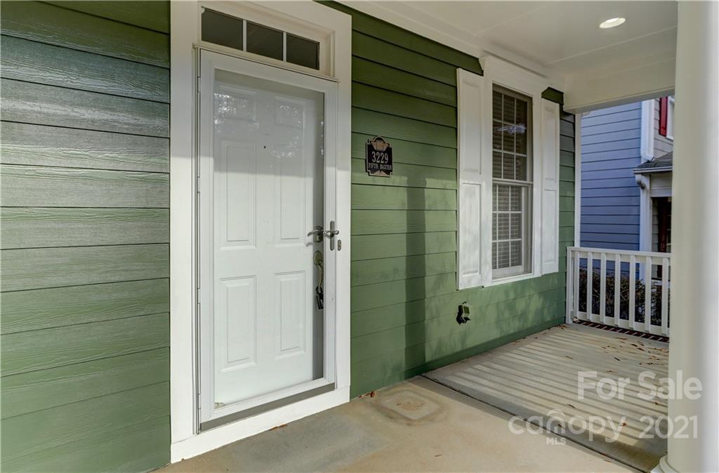 3229 Fifth Baxter Crossing Fort Mill, SC 29708 - Photo 10 of 46 a view of a house with a door and wooden floor
