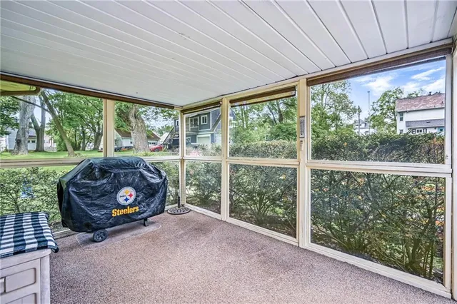a outdoor space with furniture and wooden floor