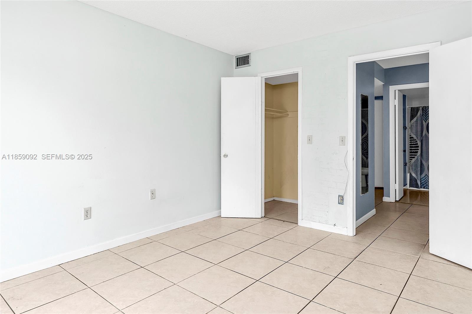 7747 Southwest 86th Street, Unit D106 Miami, FL 33143 - Photo 19 of 19 a view of an empty room