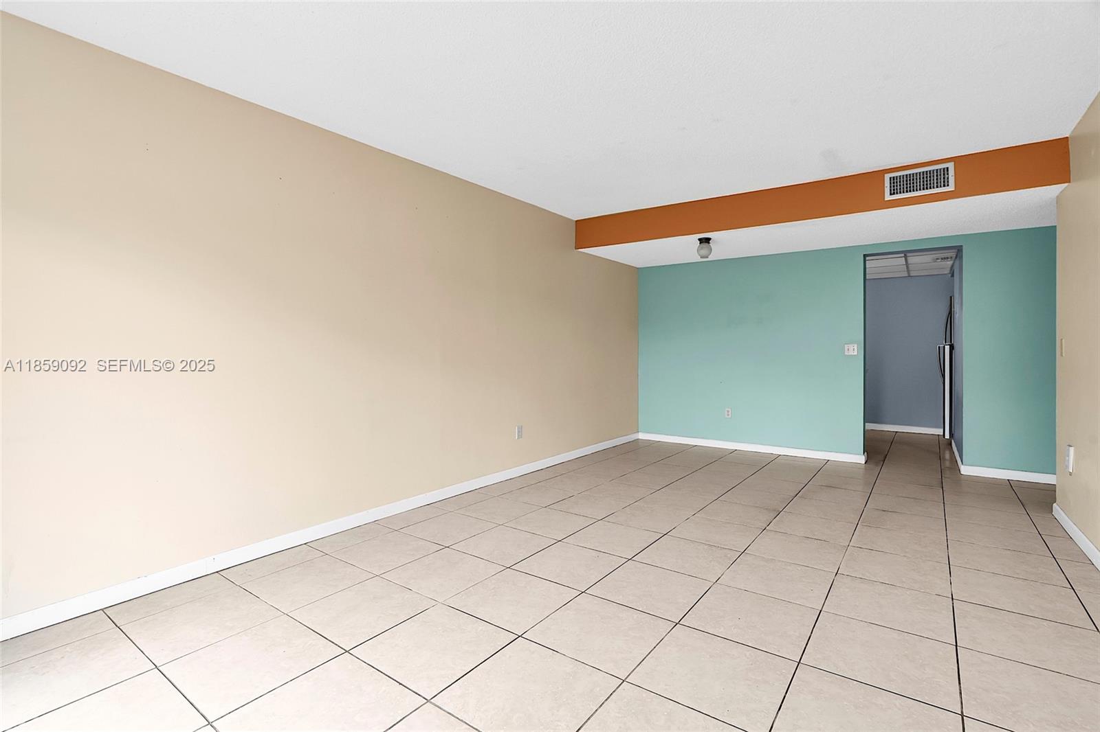 7747 Southwest 86th Street, Unit D106 Miami, FL 33143 - Photo 9 of 19 a view of an empty room