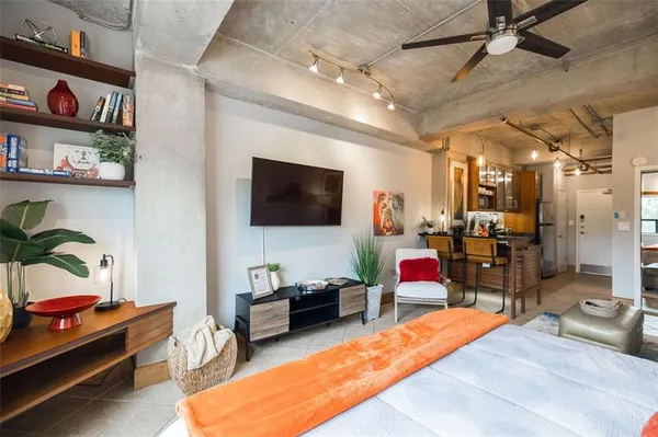 a living room with furniture and a couch
