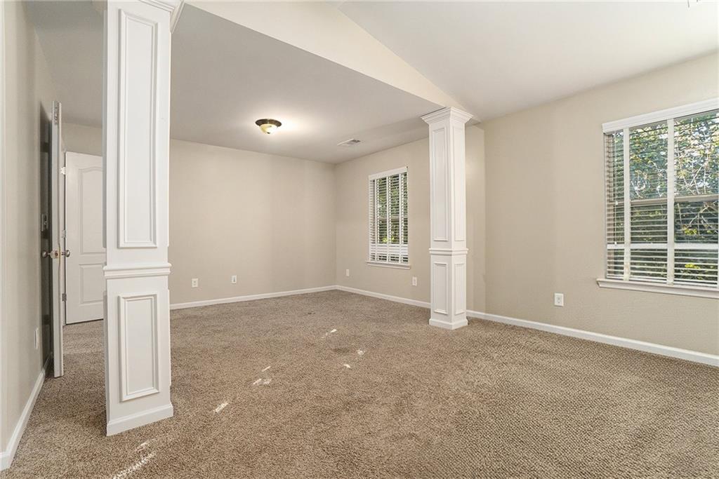3989 Princeton Lakes Pass Southwest Atlanta, GA 30331 - Photo 12 of 25 an empty room with windows