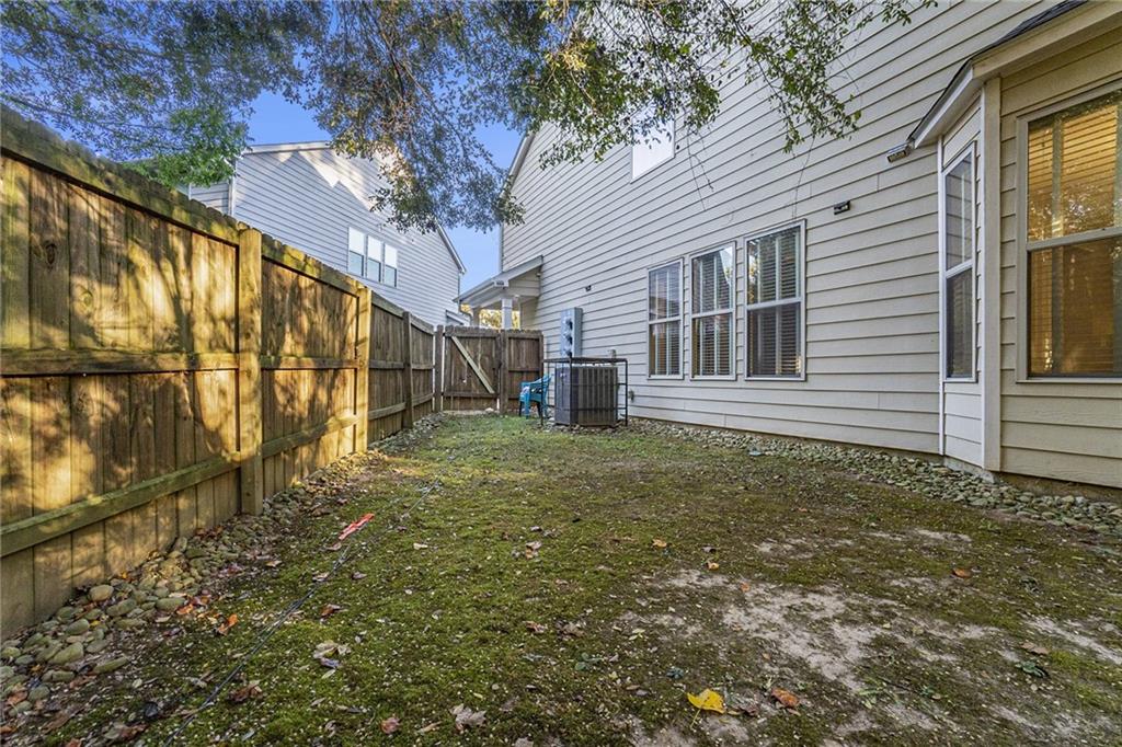 3989 Princeton Lakes Pass Southwest Atlanta, GA 30331 - Photo 25 of 25 a view of an house with backyard and garden