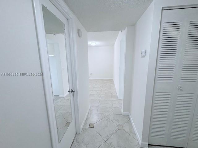 7785 Southwest 86th Street, Unit E219 Miami, FL 33143 - Photo 6 of 9 a bathroom with a shower