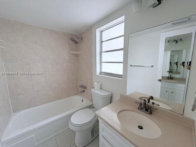7785 Southwest 86th Street, Unit E219 Miami, FL 33143 - Photo 8 of 9 a bathroom with a sink toilet and shower