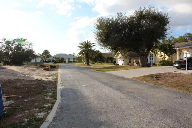 a view of road with trees