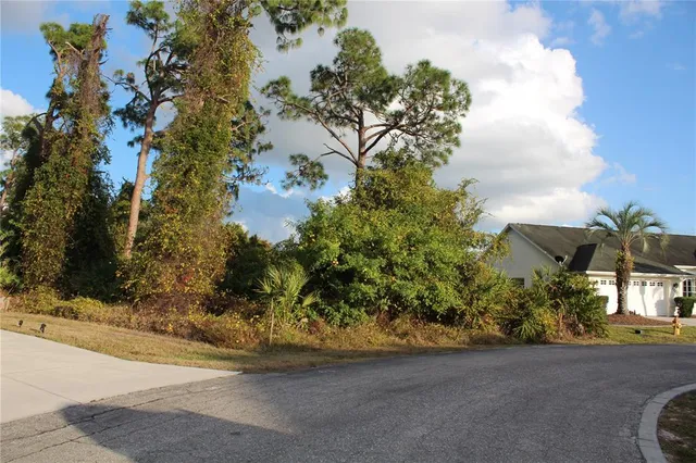 a view of a house with a street