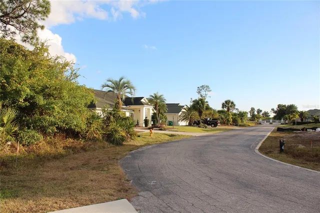 a view of a street with houses