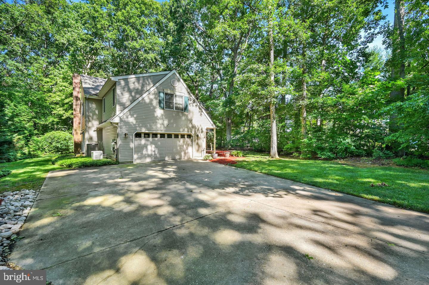 176 Burning Tree Road Dover, DE 19904 - Photo 2 of 33 Charming home nestled in lush greenery.