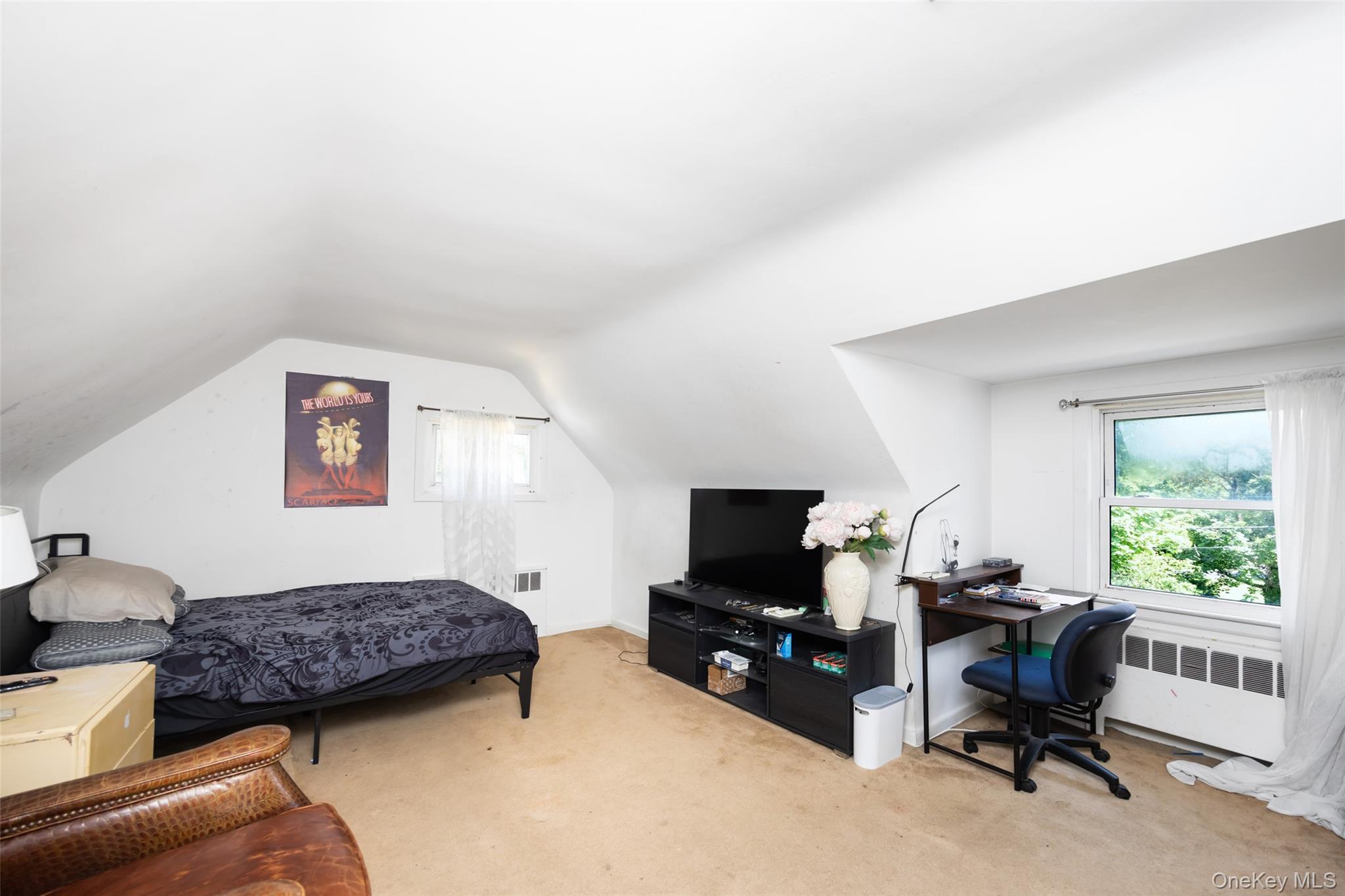 84 Middle Neck Road Roslyn, NY 11576 - Photo 27 of 44 a view of a livingroom with workspace and a window