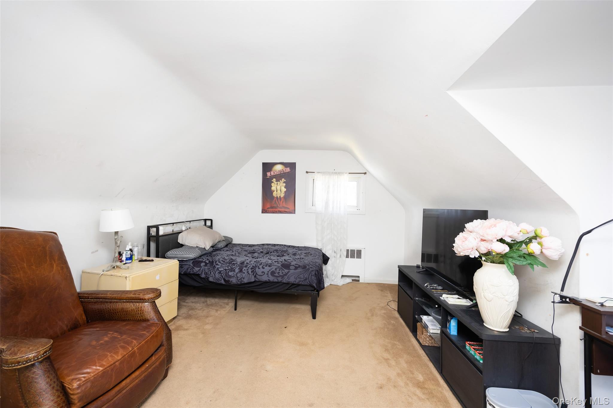 84 Middle Neck Road Roslyn, NY 11576 - Photo 28 of 44 a living room with furniture and flowers