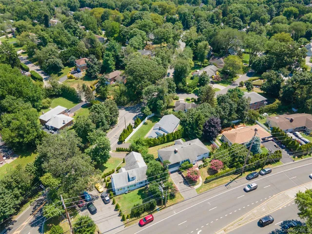 an aerial view of a house with a garden