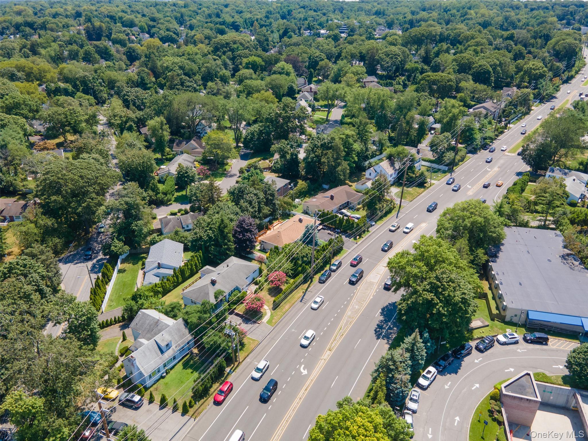 84 Middle Neck Road Roslyn, NY 11576 - Photo 41 of 44 an aerial view of residential houses with outdoor space