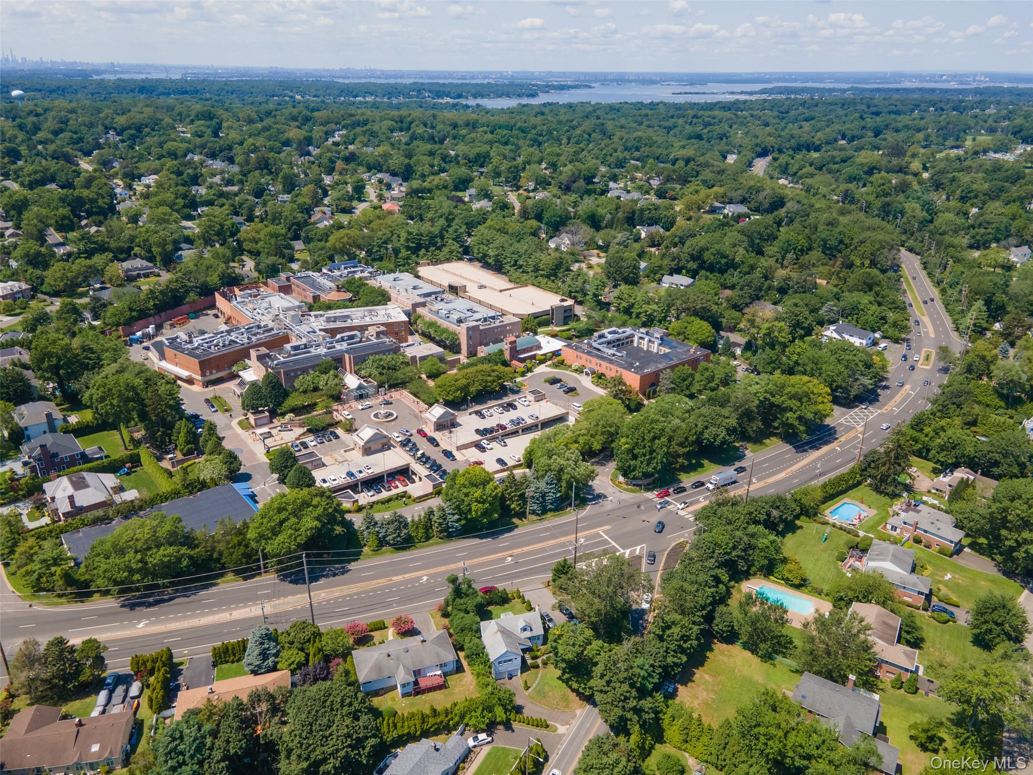84 Middle Neck Road Roslyn, NY 11576 - Photo 43 of 44 an aerial view of a city with lots of residential buildings