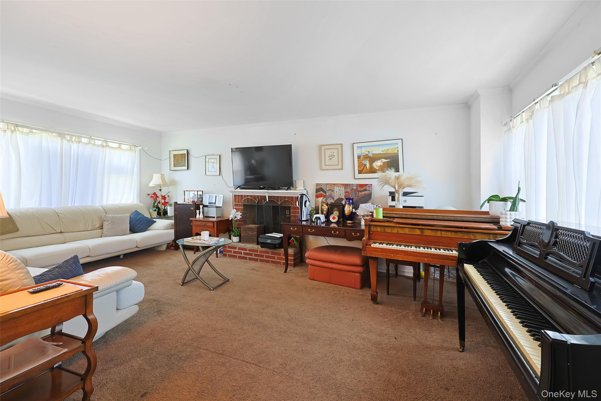 84 Middle Neck Road Roslyn, NY 11576 - Photo 7 of 44 a living room with furniture and a flat screen tv