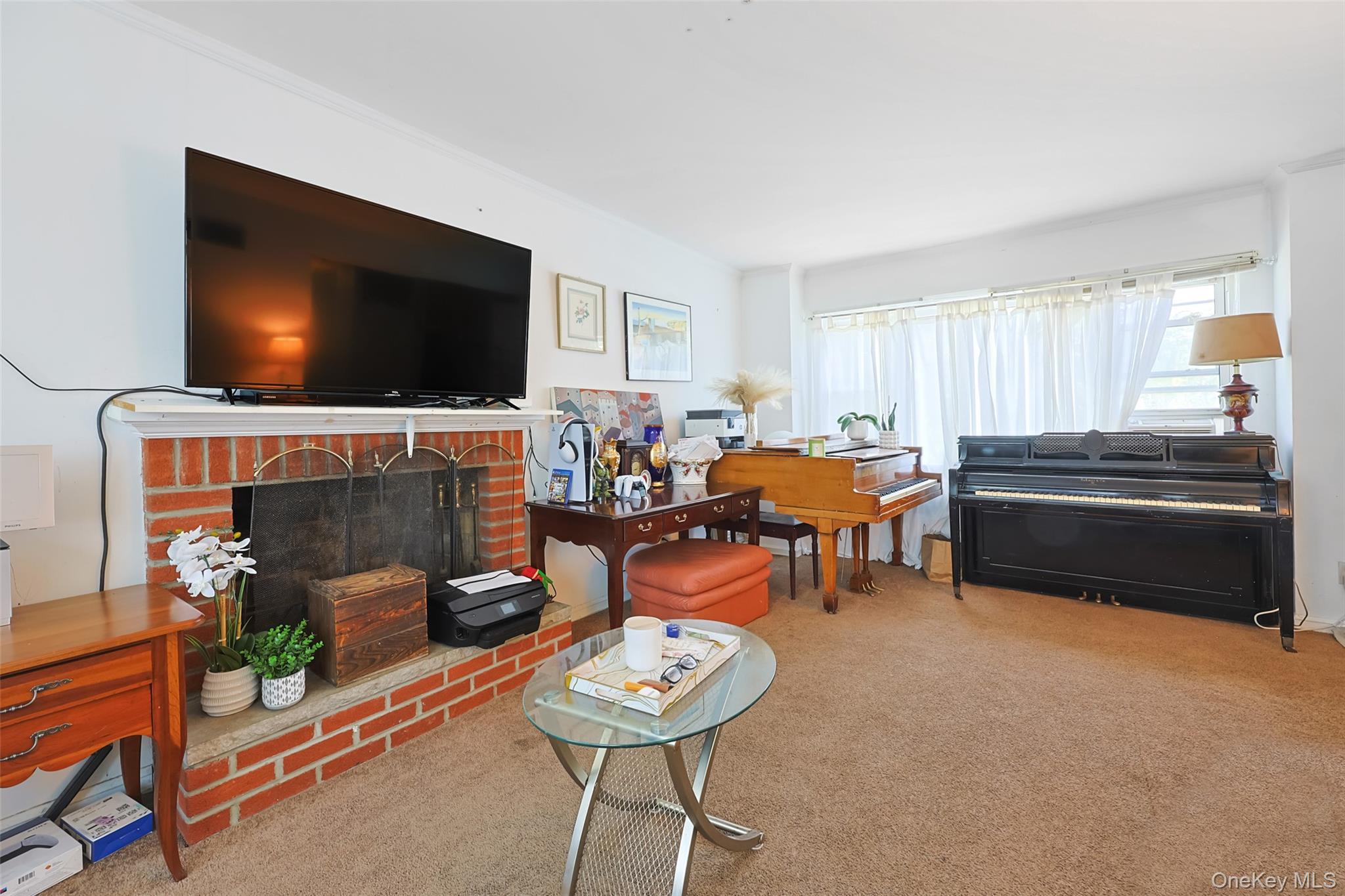 84 Middle Neck Road Roslyn, NY 11576 - Photo 10 of 44 a living room with furniture and a flat screen tv
