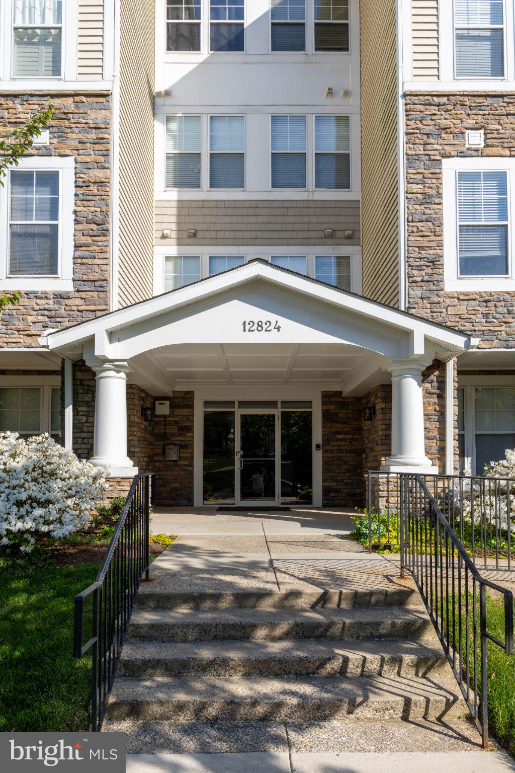 12824 Clarksburg Square Road, Unit 105 Clarksburg, MD 20871 - Photo 4 of 96 Charming entrance to a modern residence.