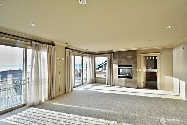a spacious bathroom with a tub sink shower and mirror