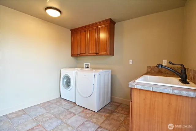 a open kitchen with stainless steel appliances granite countertop a stove top oven
