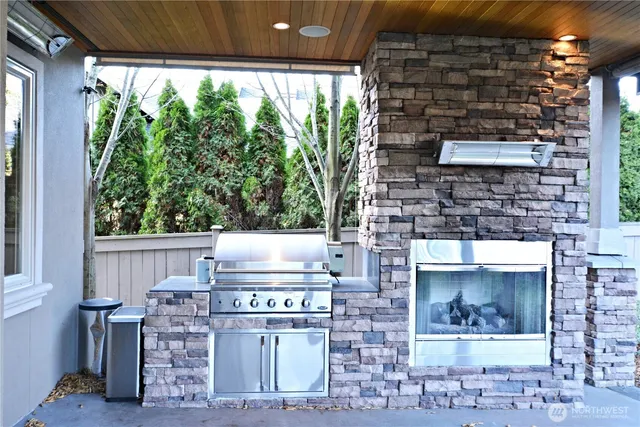 a view of a room with gym equipment and windows
