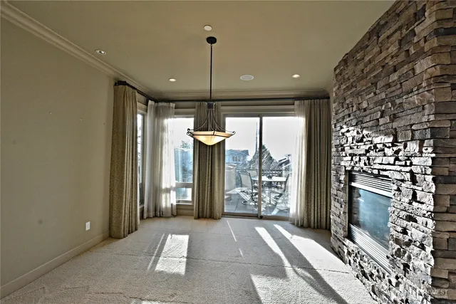 a view of a hallway with wooden shelves