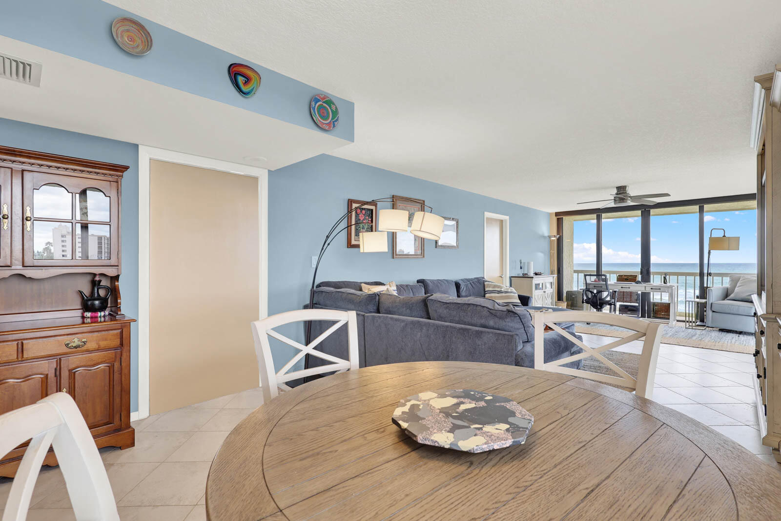 10600 South Ocean Drive, Unit 310 Jensen Beach, FL 34957 - Photo 16 of 45 a living room with furniture and a table