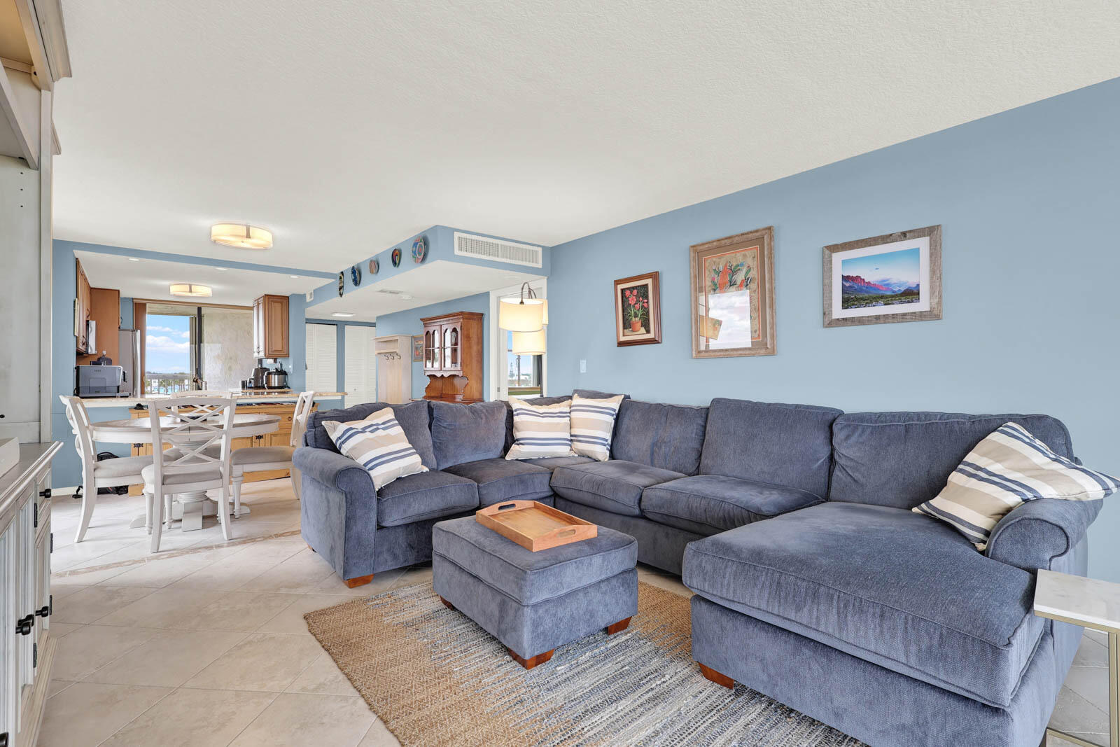 10600 South Ocean Drive, Unit 310 Jensen Beach, FL 34957 - Photo 5 of 45 a living room with furniture and a couch