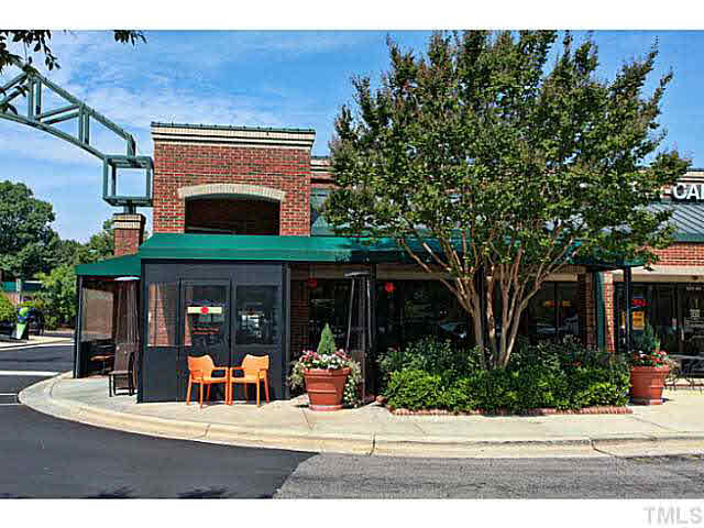 2821 Edridge Court, Unit 101 Raleigh, NC 27612 - Photo 24 of 25 a view of a house with a patio