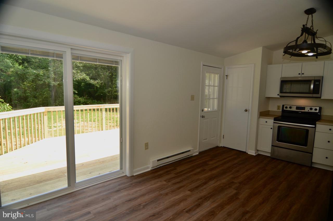 23720 Owasso Road Chestertown, MD 21620 - Photo 13 of 15 Kitchen leads to new deck