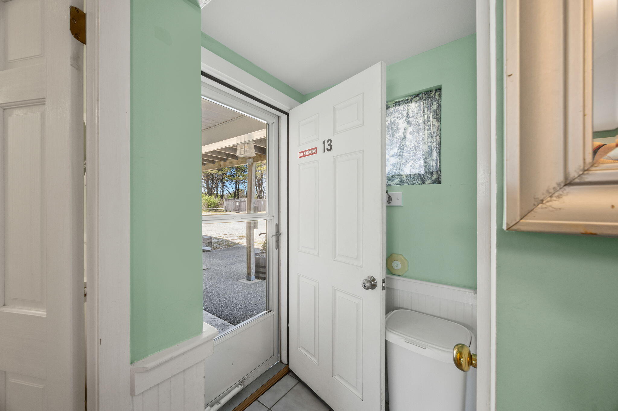 132 Shore Road, Unit 13 Truro, MA 02666 - Photo 3 of 21 a bathroom with a tub and shower
