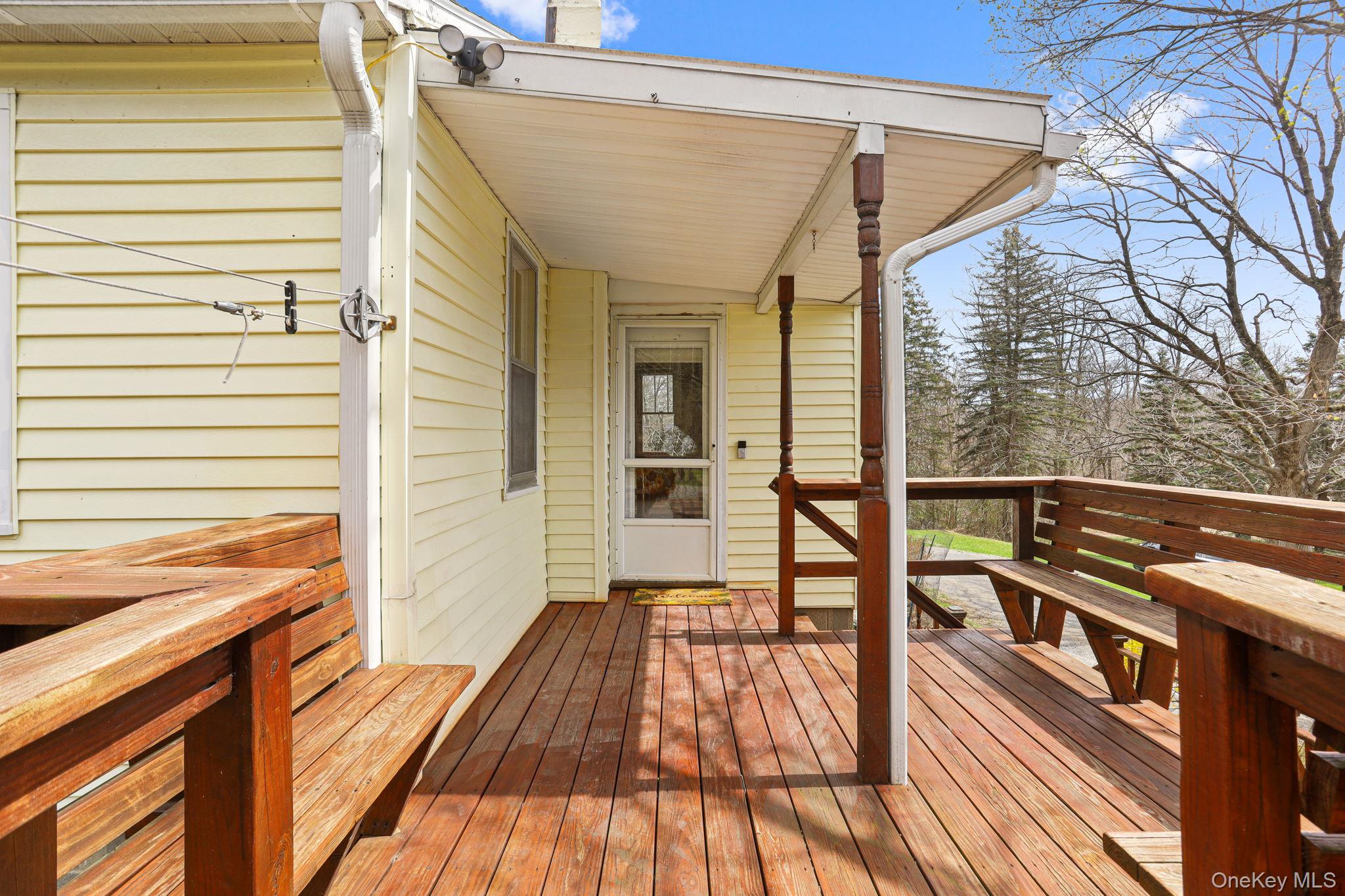 770 Gahbauer Road Hudson, NY 12534 - Photo 20 of 39 a view of outdoor space with wooden floor and seating