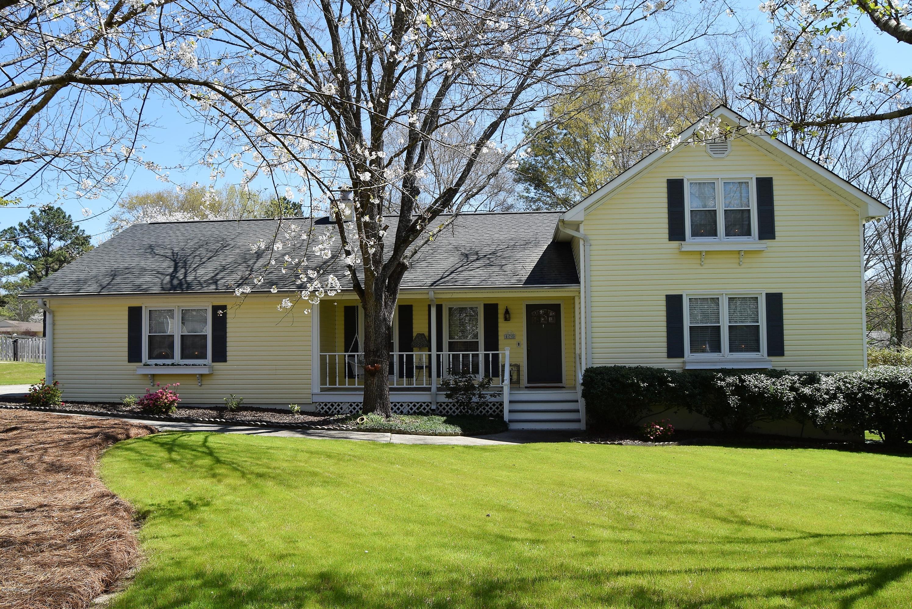 a front view of house with yard
