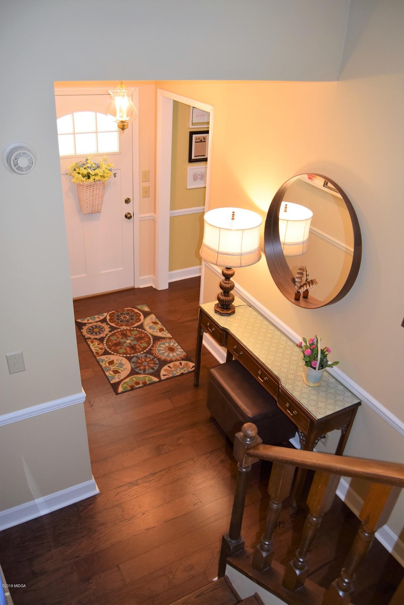 475 Stone Edge Road Macon, GA 31210 - Photo 5 of 36 a living room with a wooden floor