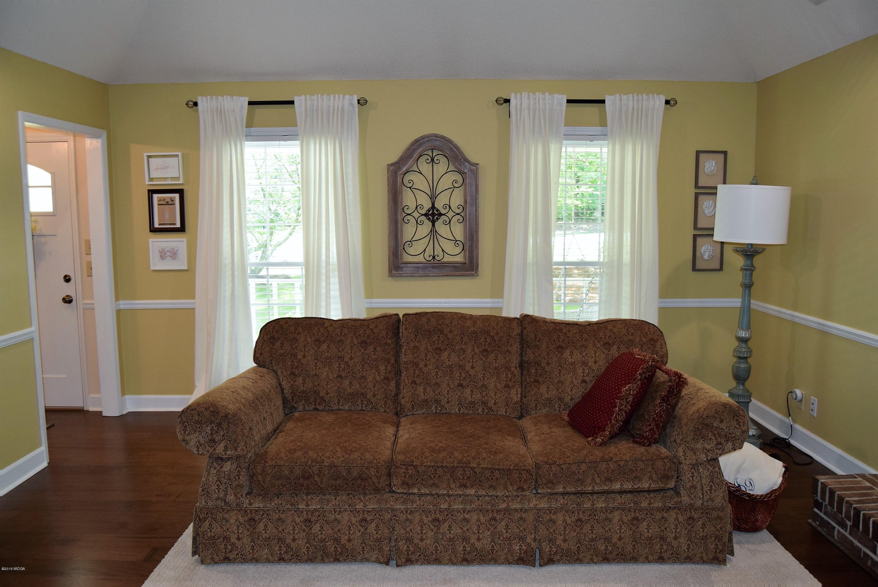 475 Stone Edge Road Macon, GA 31210 - Photo 6 of 36 a living room with furniture and a window