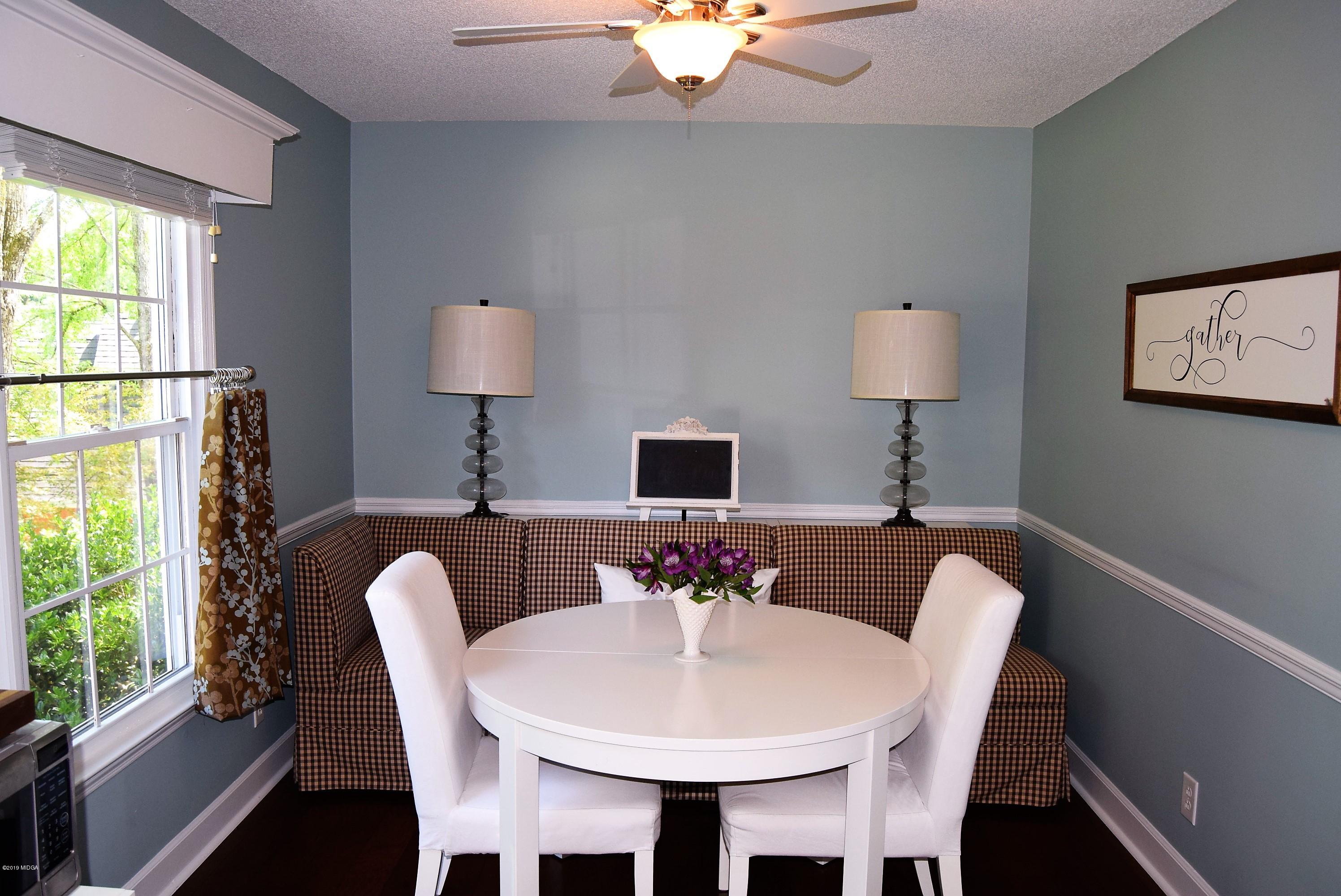 475 Stone Edge Road Macon, GA 31210 - Photo 9 of 36 a view of a dining room with furniture and a window