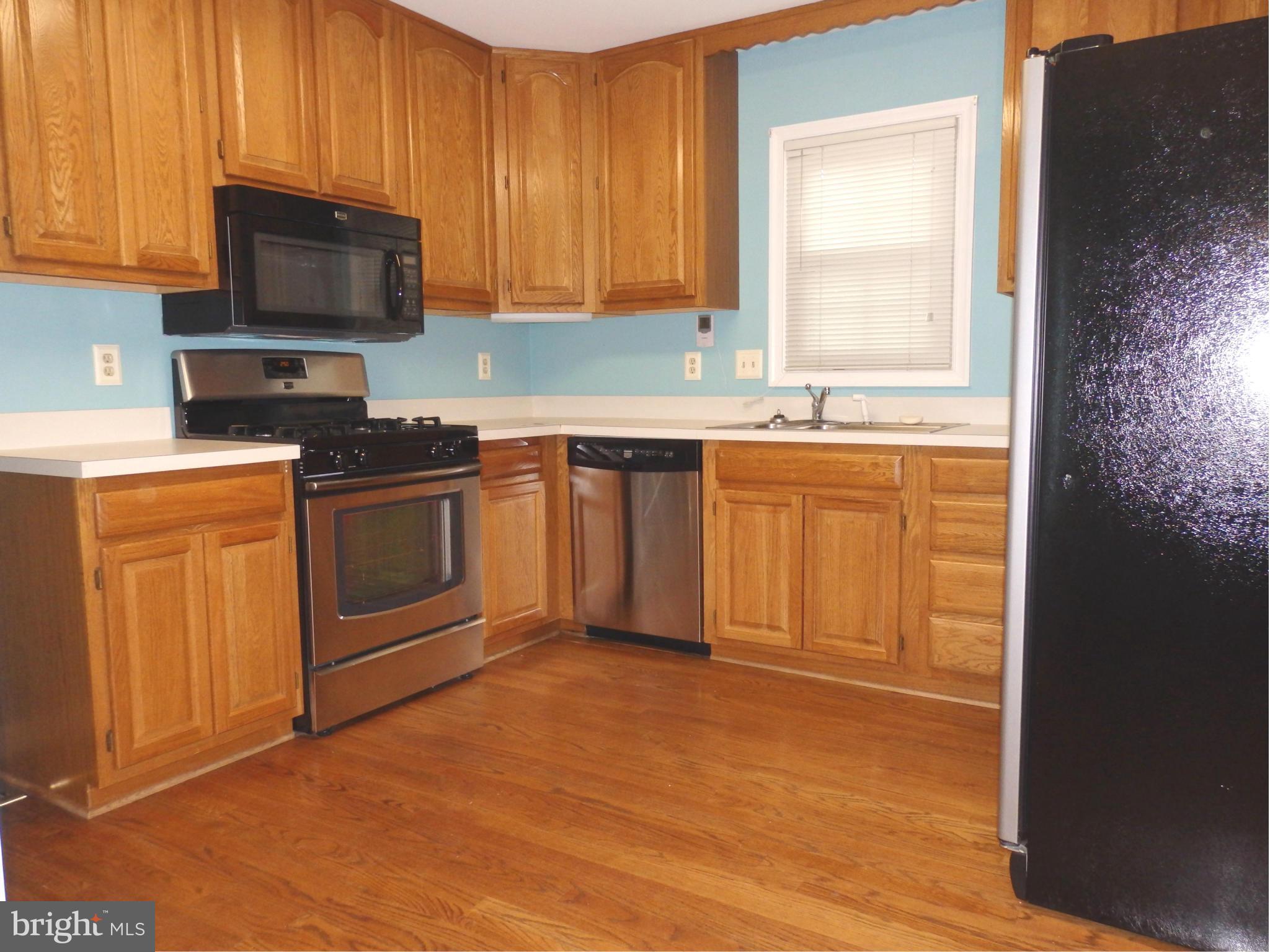 2419 Bear Den Road Frederick, MD 21701 - Photo 11 of 24 Kitchen has oak cabinets