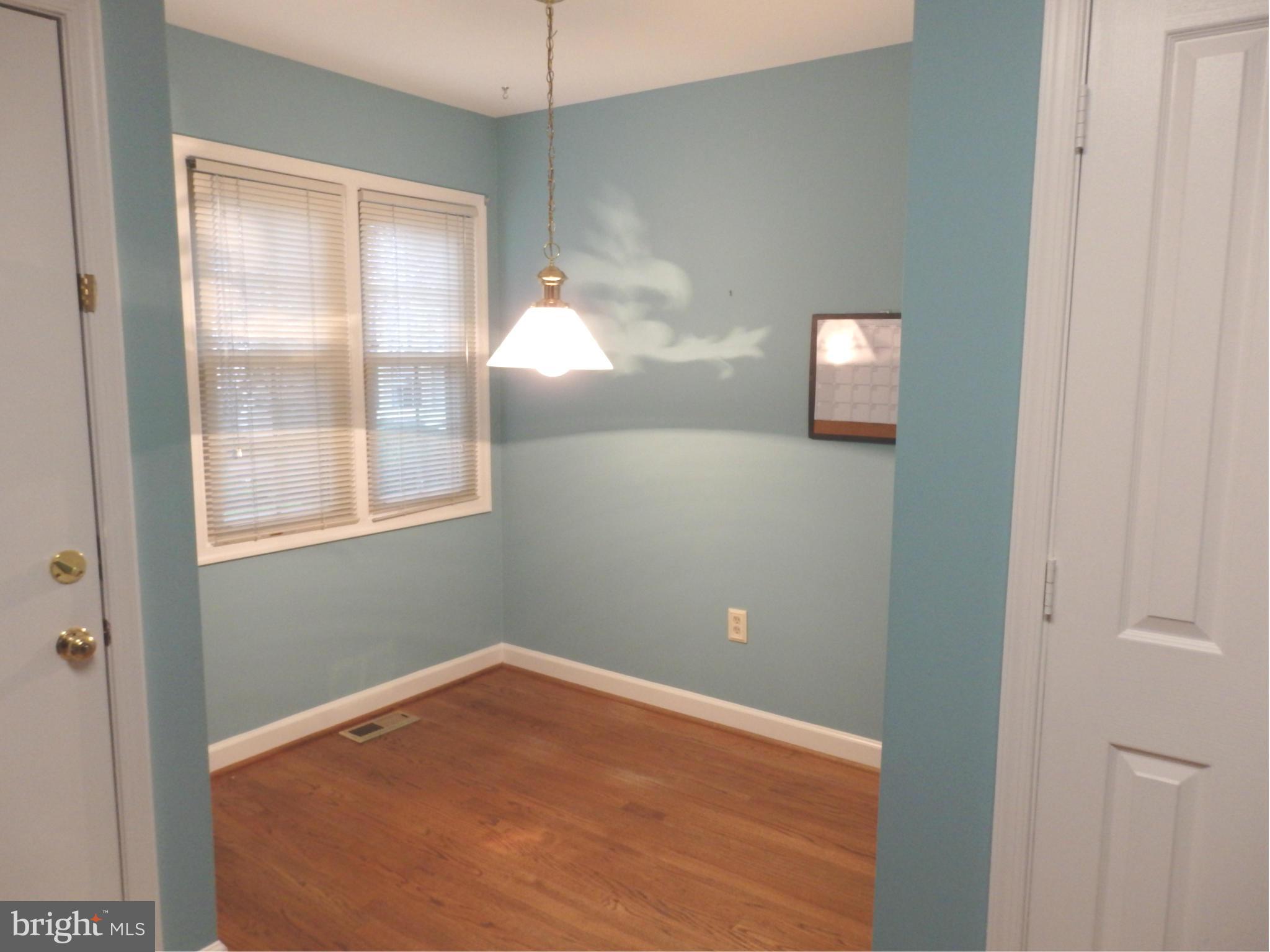 2419 Bear Den Road Frederick, MD 21701 - Photo 12 of 24 Breakfast room has hardwood flooring and light