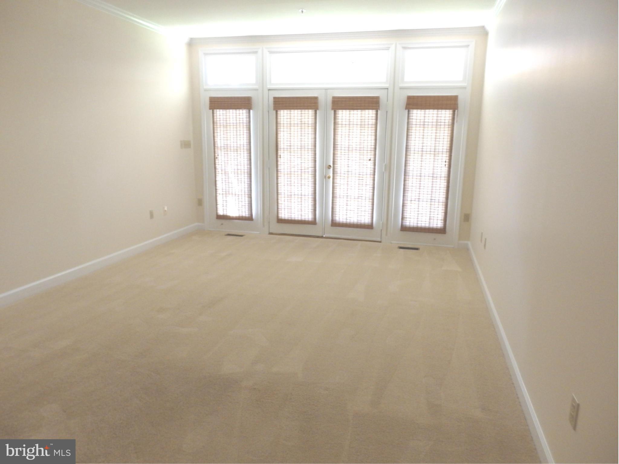 2419 Bear Den Road Frederick, MD 21701 - Photo 9 of 24 Living Room leads to screened porch
