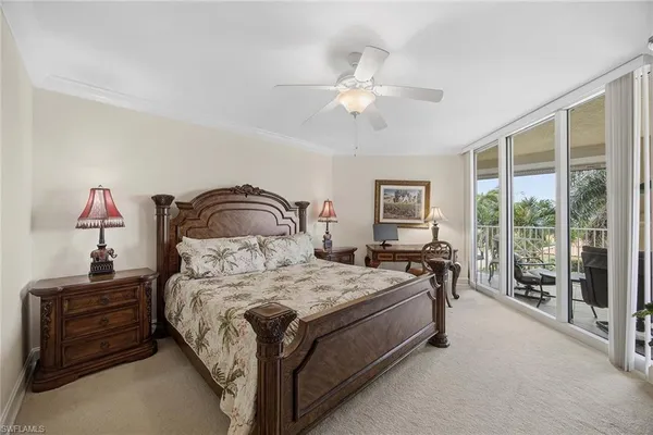 a bedroom with a bed dresser and a window