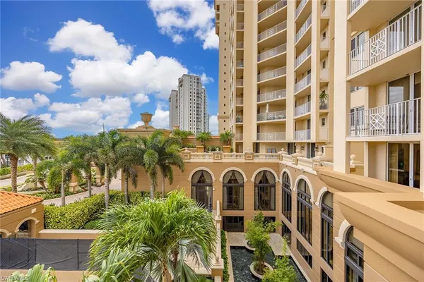 a view of balcony with furniture