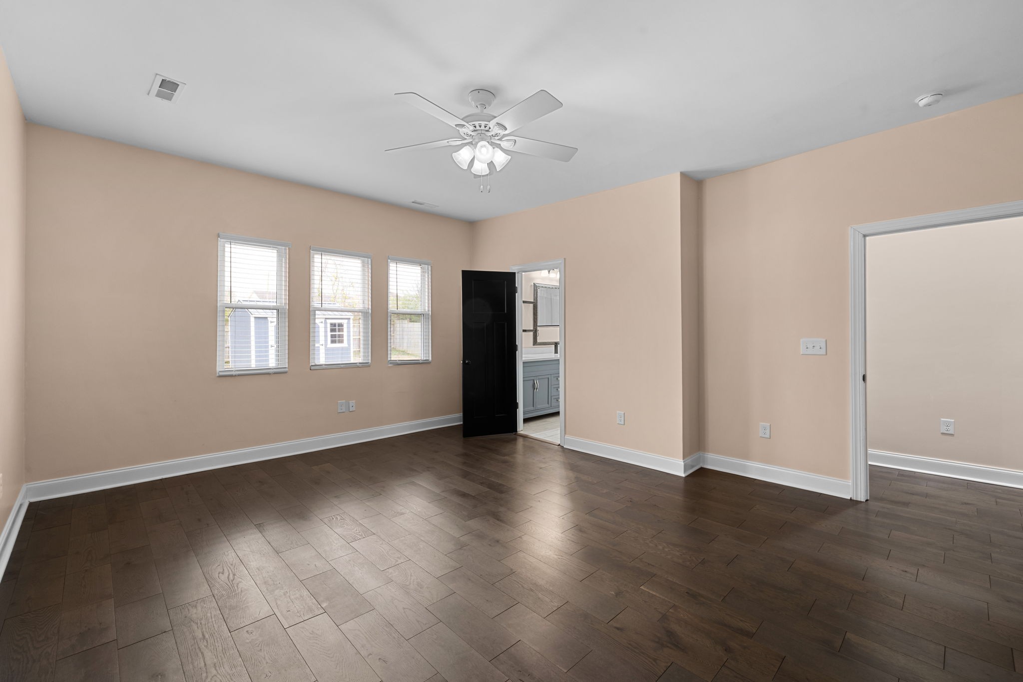 106 East 9th Street Columbia, TN 38401 - Photo 21 of 94 a view of an empty room with wooden floor and a window