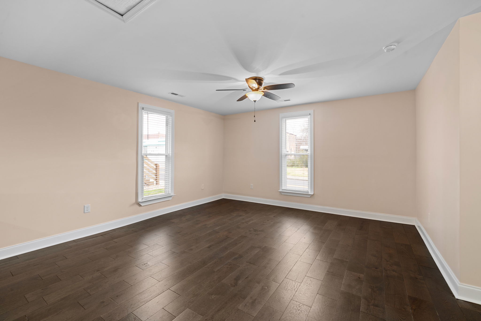 106 East 9th Street Columbia, TN 38401 - Photo 32 of 94 a view of an empty room with wooden floor and a window