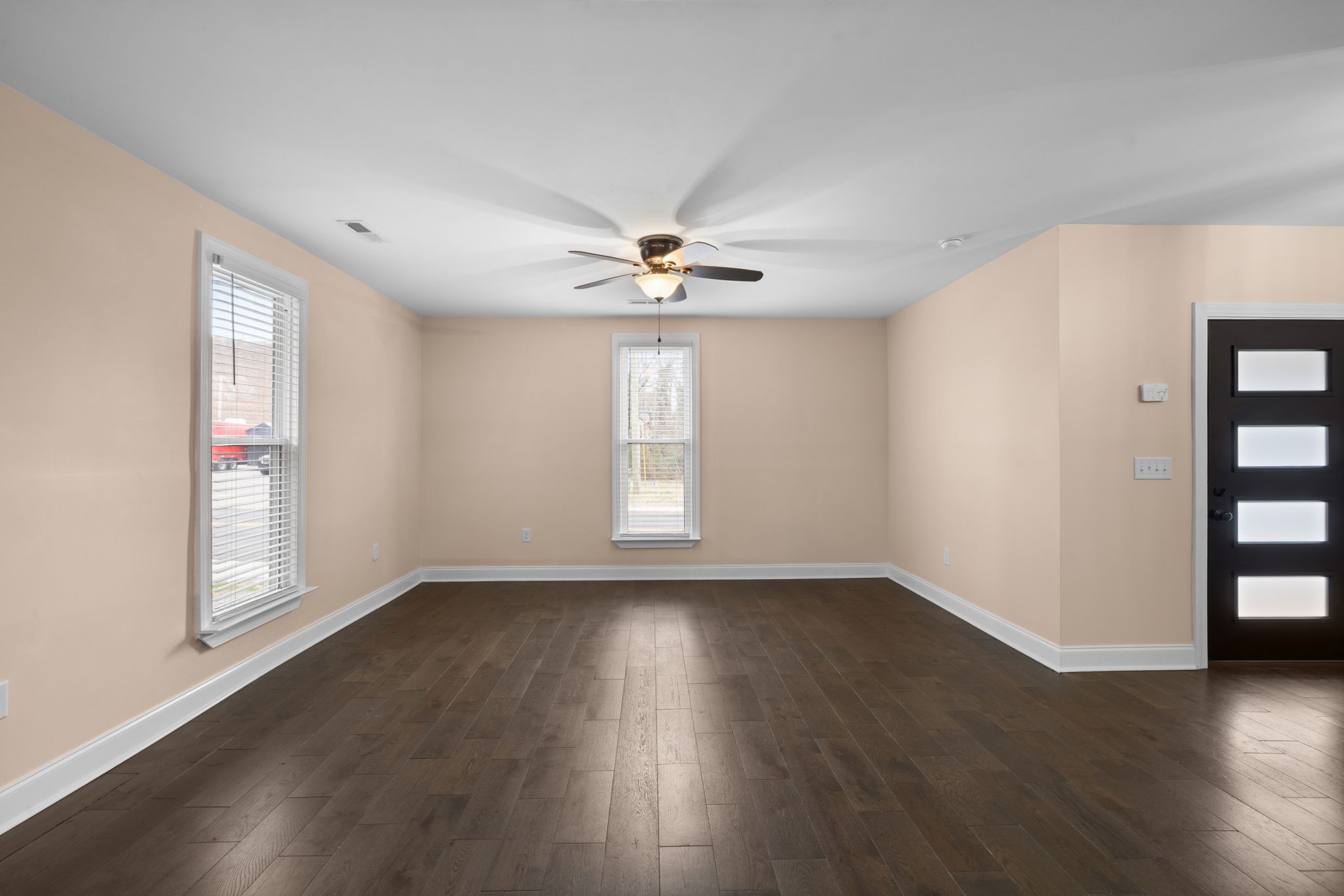 106 East 9th Street Columbia, TN 38401 - Photo 33 of 94 a view of an empty room with wooden floor and a window