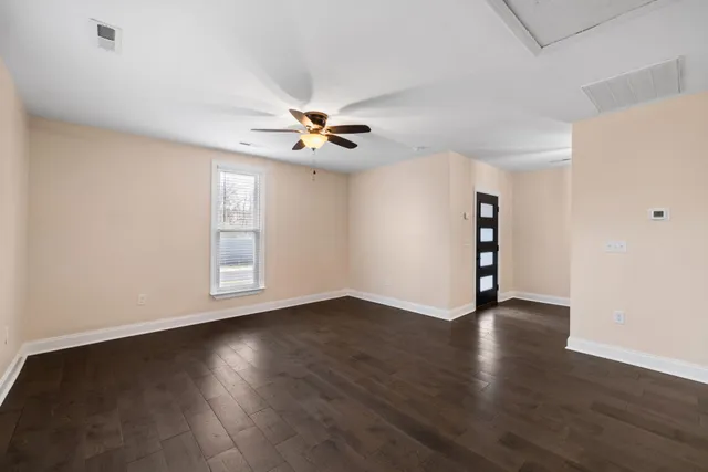 a house with yard in front of it