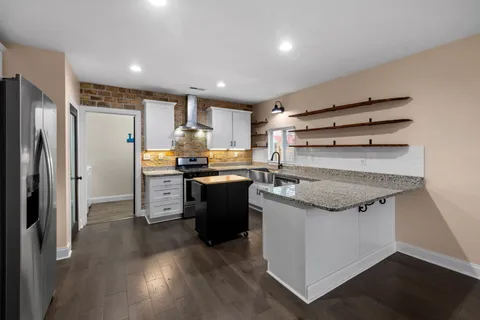 a front view of a house with a ocean view