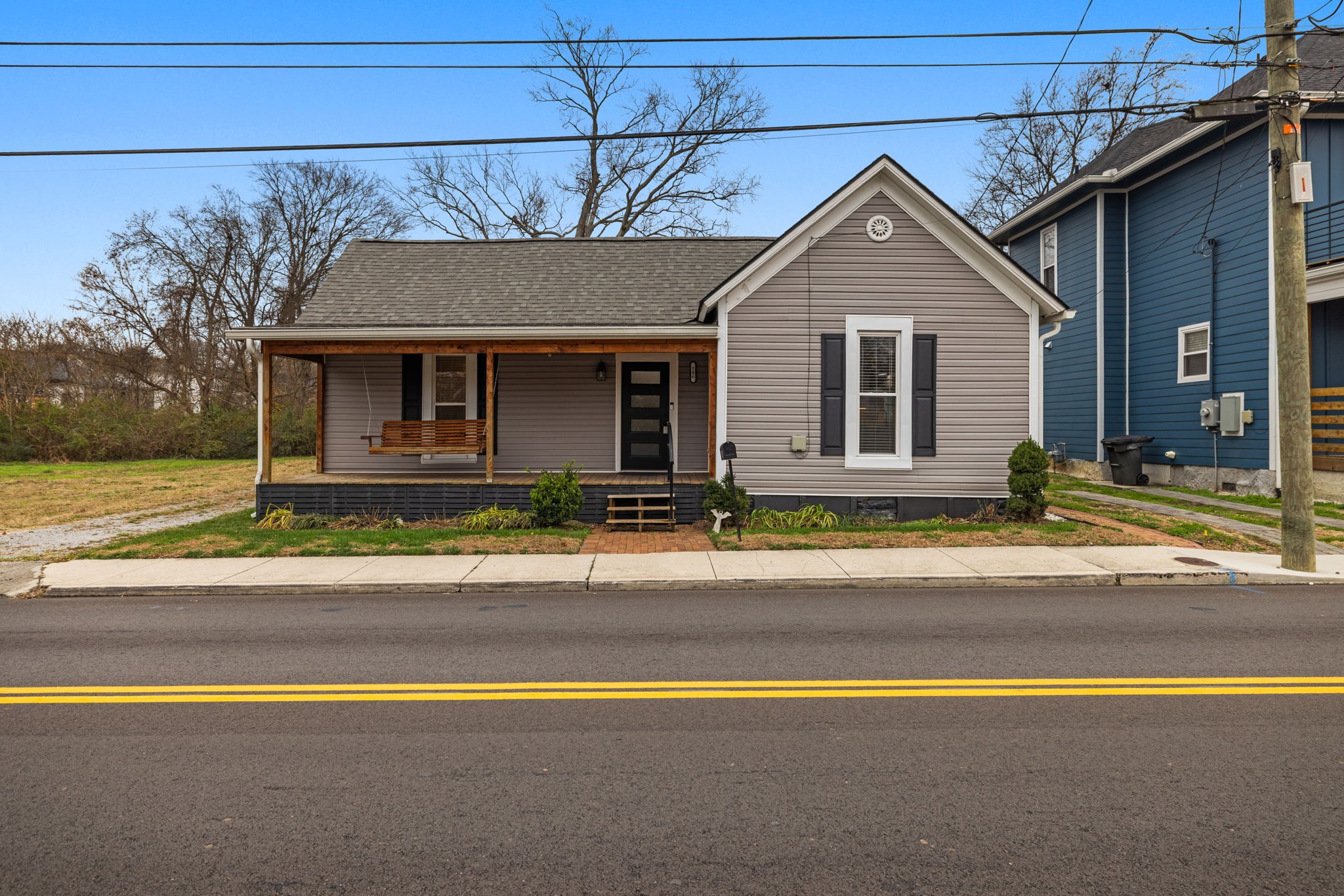 106 East 9th Street Columbia, TN 38401 - Photo 8 of 94 a front view of a house with a yard and garage