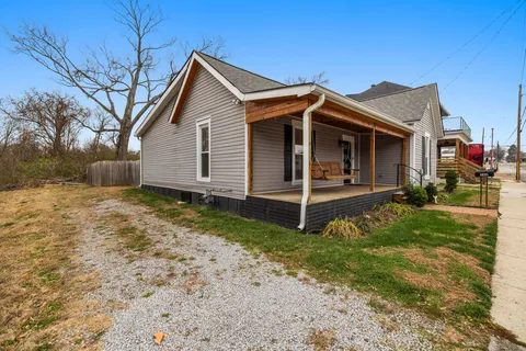 a bathroom with a toilet and a bathtub