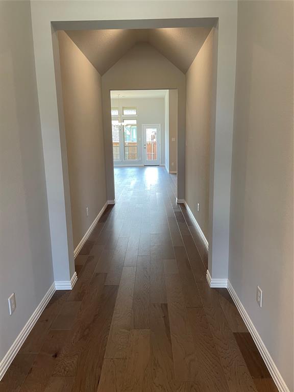 13969 Falcon Ranch Drive Frisco, TX 75035 - Photo 2 of 25 wooden floor in a hall with an entryway